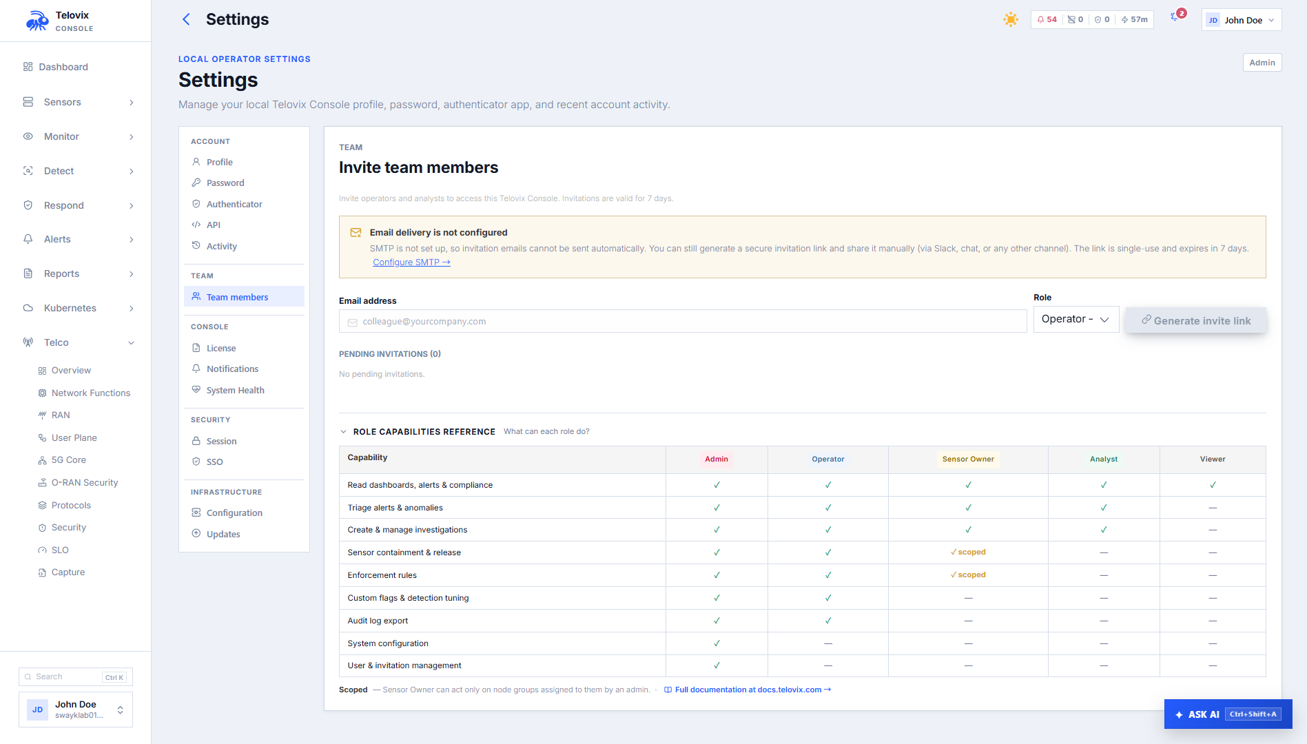 Settings > Users page showing the Invite User dialog with the email field and role dropdown.