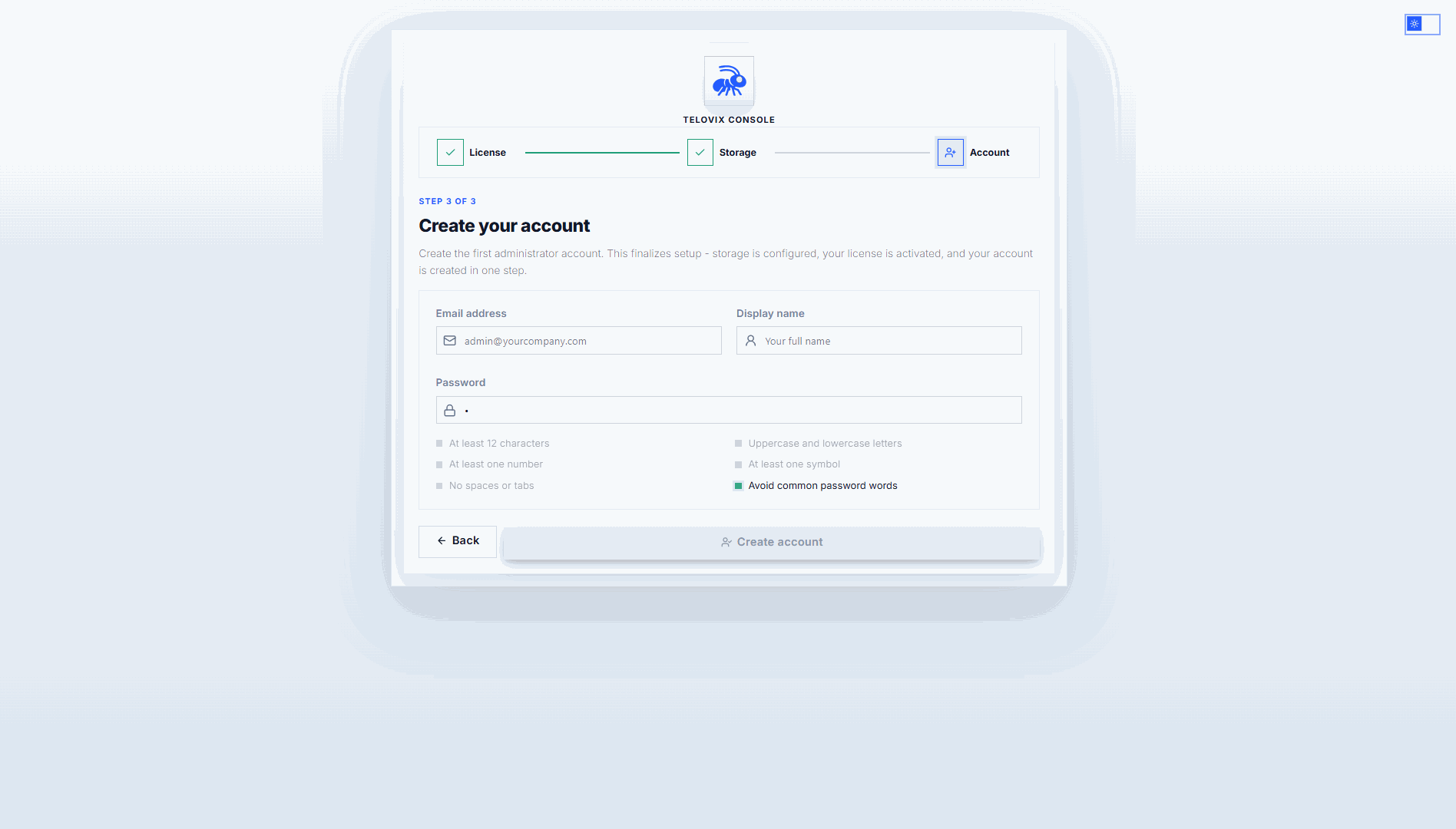 Setup wizard admin creation step showing the email, display name, and password fields with strength indicators.